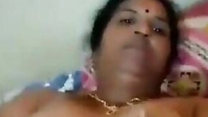 Desi mature with immense XXX boobs and tries to lick nipples