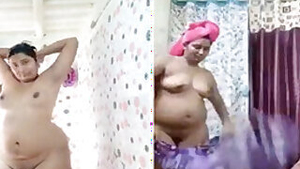 Chubby Indian housewife carefully washes XXX body in solo sex clip