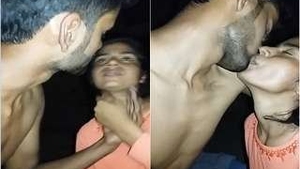 Indian lovers share a romantic kiss