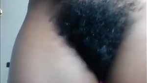 Experience the wild side of African beauty with her unshaven pussy