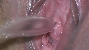 Watch a woman pee on her padlock in this kinky video