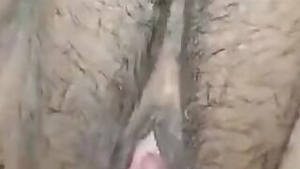 Close up video of the man making Indian wife using fingers