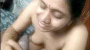 A Telugu housewife receives oral and vaginal penetration in a heated video