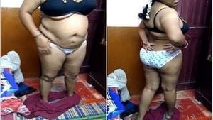 Watch a stunning Tamil wife in steamy action