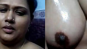 Fat Desi woman with her huge hooters records sex clip in bathroom