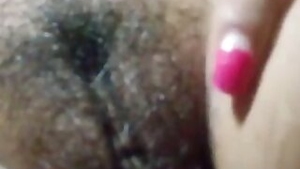 Cute girl showing her hairy wet pussy