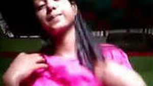 Cute Indian girl teases with her big breasts and fingers her pussy