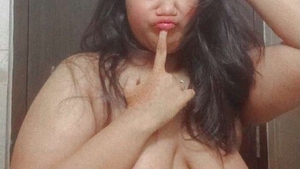 A stunning and voluptuous Bangladeshi girl entices with her attractive physique