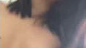 A South Asian woman screams with pleasure during intense lovemaking