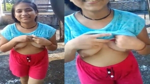 College girl flaunts her perky tits in the great outdoors