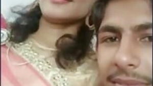 Desi couple enjoying the spotlight in this one