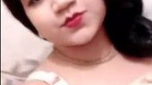 Stunning wife displays her large breasts and intimate area