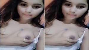 Exclusive Indian video of a hot Kolkata girl flaunting her boobs and pussy