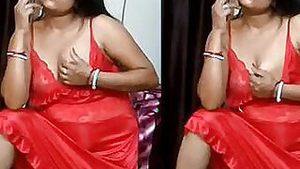 Desi smoking babe in a red nightgown shows sex tit in XXX homemade show